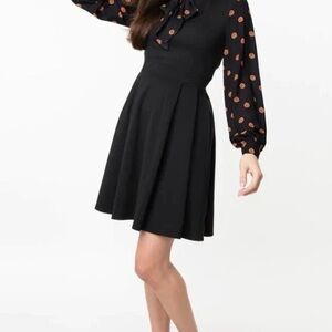 Unique Vintage Elegant Black Dress with Patterned Sleeves